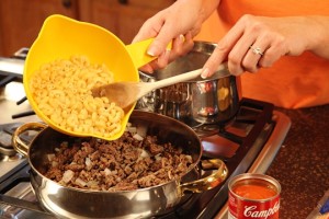 Add Cooked Macaroni to the Beef and Onion Mixture