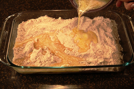 Pour Melted Butter over Apple Spice Cake Pudding